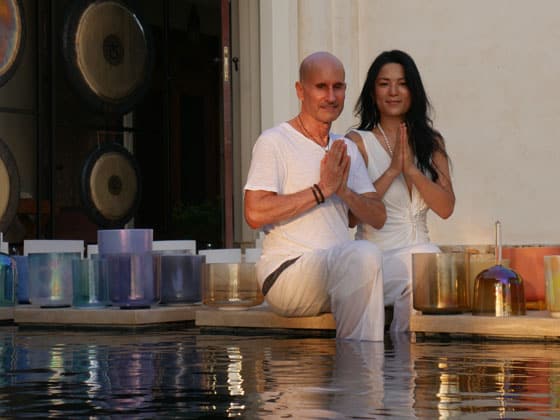 Ayi land Michael leading a meditative sound journey with crystal bowls and gongs in Costa Rica